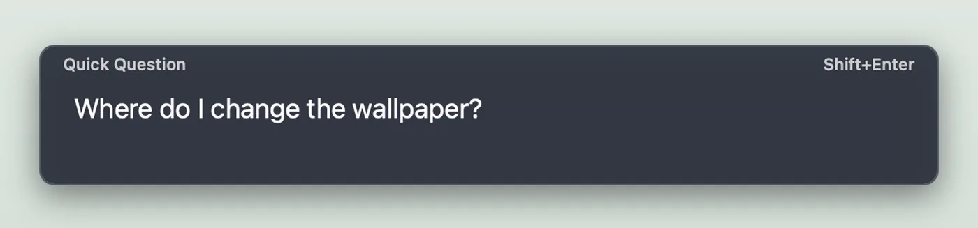 Cue Quick Question card with the typed question "Where do I change the wallpaper?" and the Shift+Enter hint.